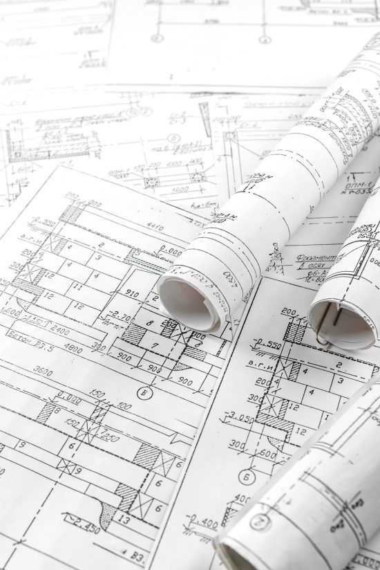 architectural-blueprints-and-rolled-documents-on-t-2026-01-09-00-17-52-utc